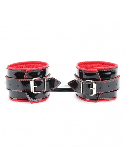 Лаковые чёрно-красные перфорированные наручники - БДСМ Арсенал - купить с доставкой в Невинномысске